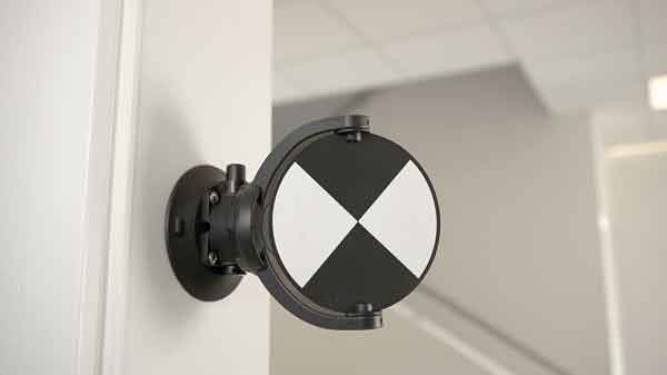 Lidar target shown mounted on a white indoor wall