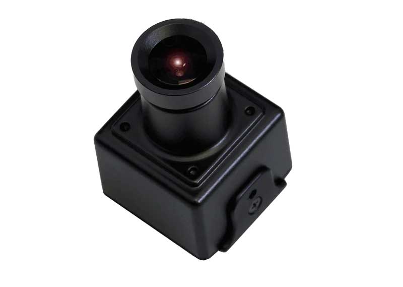 A black square security camera with a cylindrical lens assembly, shown from an elevated angle on a plain white background.