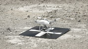 Rothbucher RSL512XL foldable cross ground control target deployed beside a mapping drone