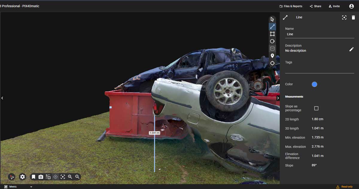 A 3D digital model of a damaged silver car and a red dumpster on a grassy terrain, shown within the software interface of PKM Dynamic with measurement and metadata panels visible on the right.