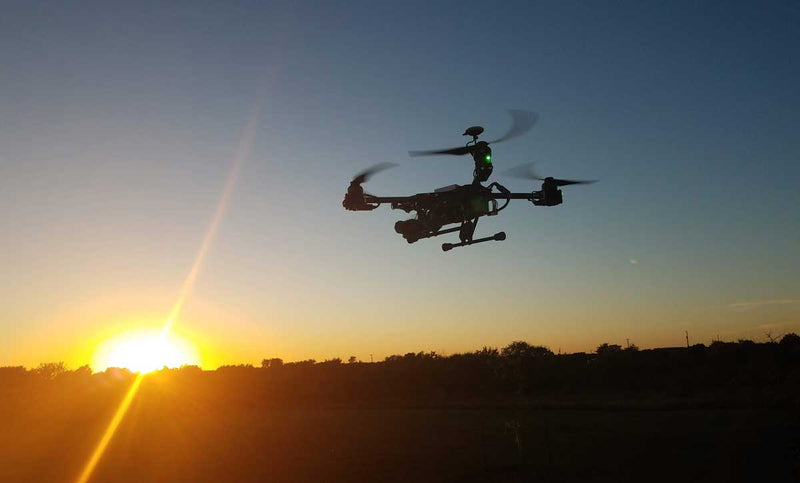 drone taking off for evening surveillance mission