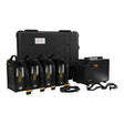 A black portable power station kit with four attached battery modules, a hard carrying case, a power supply unit, and cables on a plain white background.