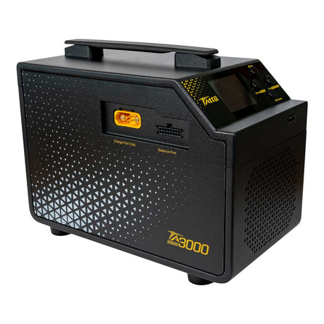 A black Taku Z3000 portable electric vehicle charger with a textured geometric pattern on the front panel, a top handle, and a digital display screen on the top right.