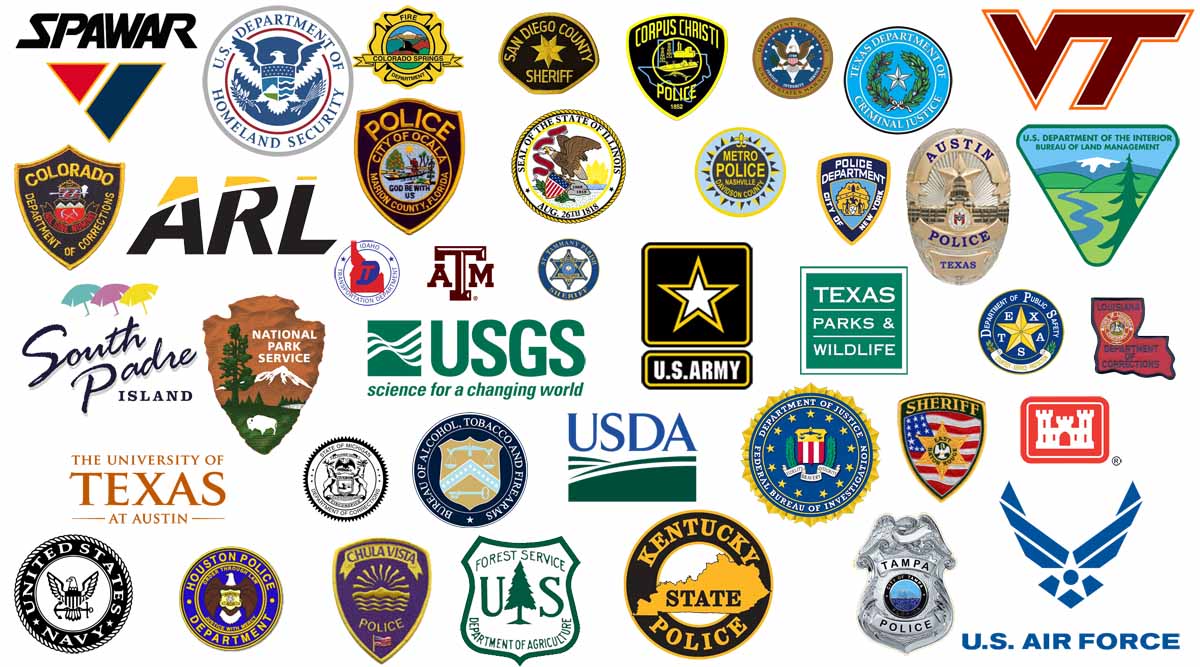Law enforcement agency patches representing agencies served by MAXSUR