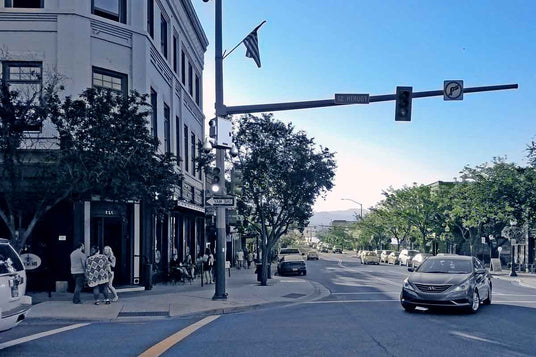 pole camera installed on city street corner