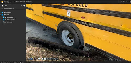 A yellow school bus side view with a damaged front tire resting on a curb, shown in a screenshot with a dark software interface visible on the left.