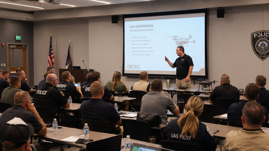 drone instructor teaching a classroom of law enforcement personnel 
