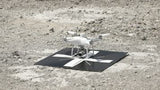 Rothbucher RSL512XL foldable cross ground control target deployed beside a mapping drone
