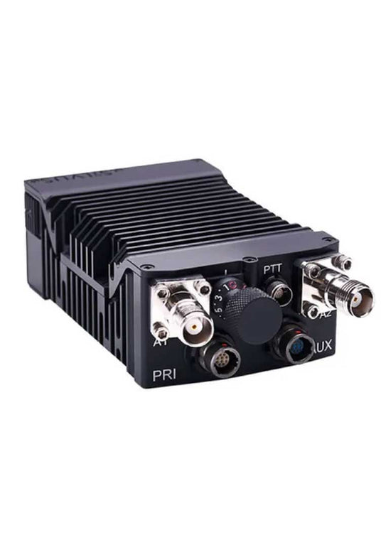 Black electronic module with various connectors on a white background