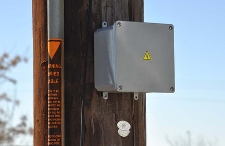 GBOX COVERT UTILITY ENCLOSURE Mounted to Wood Pole 